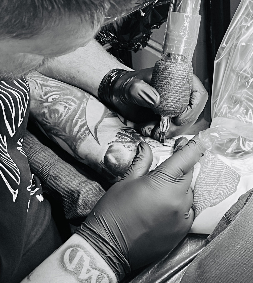 chicano tattoo on inner bicep