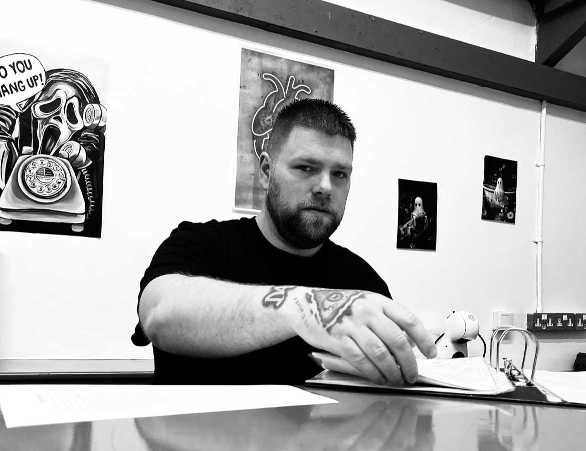 Me looking serious at the front desk
